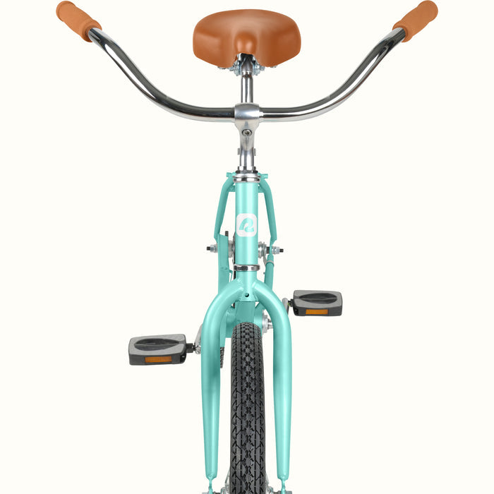 retrospec Chatham 24 inch bike girl in seafoam, showing swept handlebars and cushioned brown saddle.