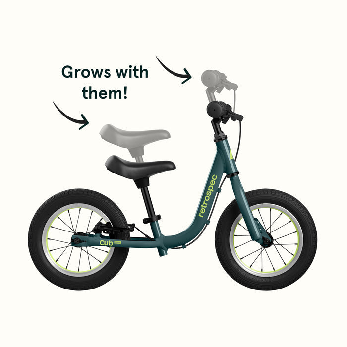 Children's balance bike with text indicating it grows with the child, on a white background.