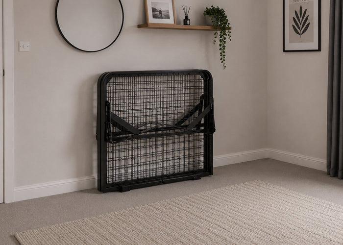 Black skid metal bed frame with reinforced mesh base and thick steel, folded for storage.