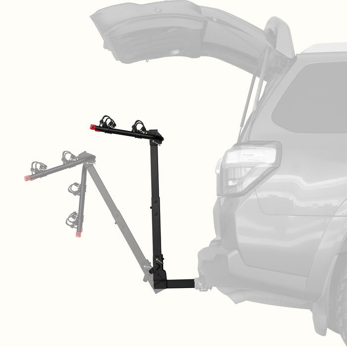retrospec Lenox Hitch Mount Car Bike Rack (2-Bike) shown in both upright and tilted-down positions on the rear of an SUV with its trunk open, demonstrating the rack's tilt-away feature for easy cargo access.