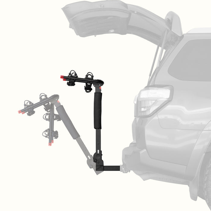 retrospec Lenox Plus Hitch Mount Car Bike Rack (2-Bike) shown in both upright and tilted-down positions on the rear of an SUV with its trunk open, demonstrating the rack's tilt-away feature for easy cargo access.