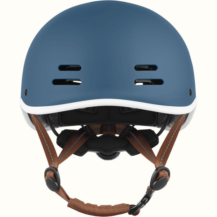 Front view of a navy blue retrospec remi youth bike helmet with white trim and a rear dial adjuster.