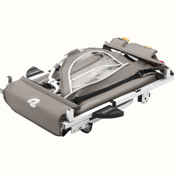 The Rover Plus Kids Bike Trailer - Single collapsed showing its compact storability.