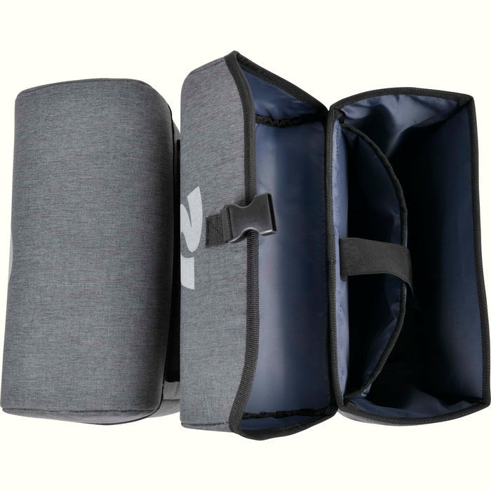 A top view of the saddle bags with one bag open revealing main and laptop sleeve compartments.