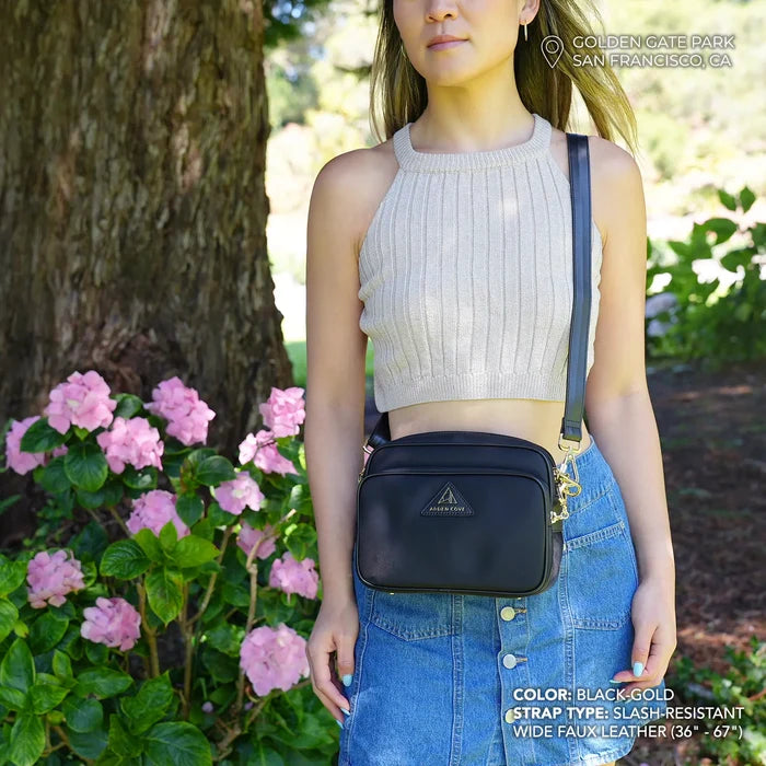 Crissy Crossbody with Faux Leather Wide Strap in Locking Hardware in Black Gold modeled