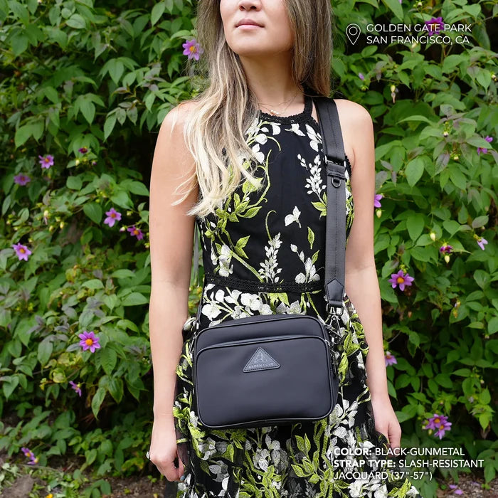 Crissy Crossbody with Slash Resistant Jacquard Strap in Locking Hardware in Black-Gunmetal modeled