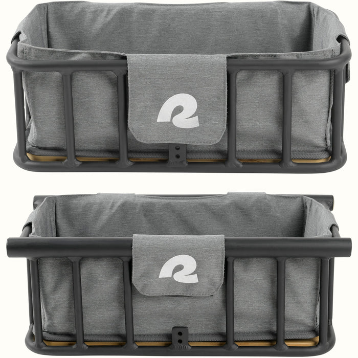 Two black metal bike baskets with a gray liner, one stacked on top of the other featuring a logoed flap on the front.